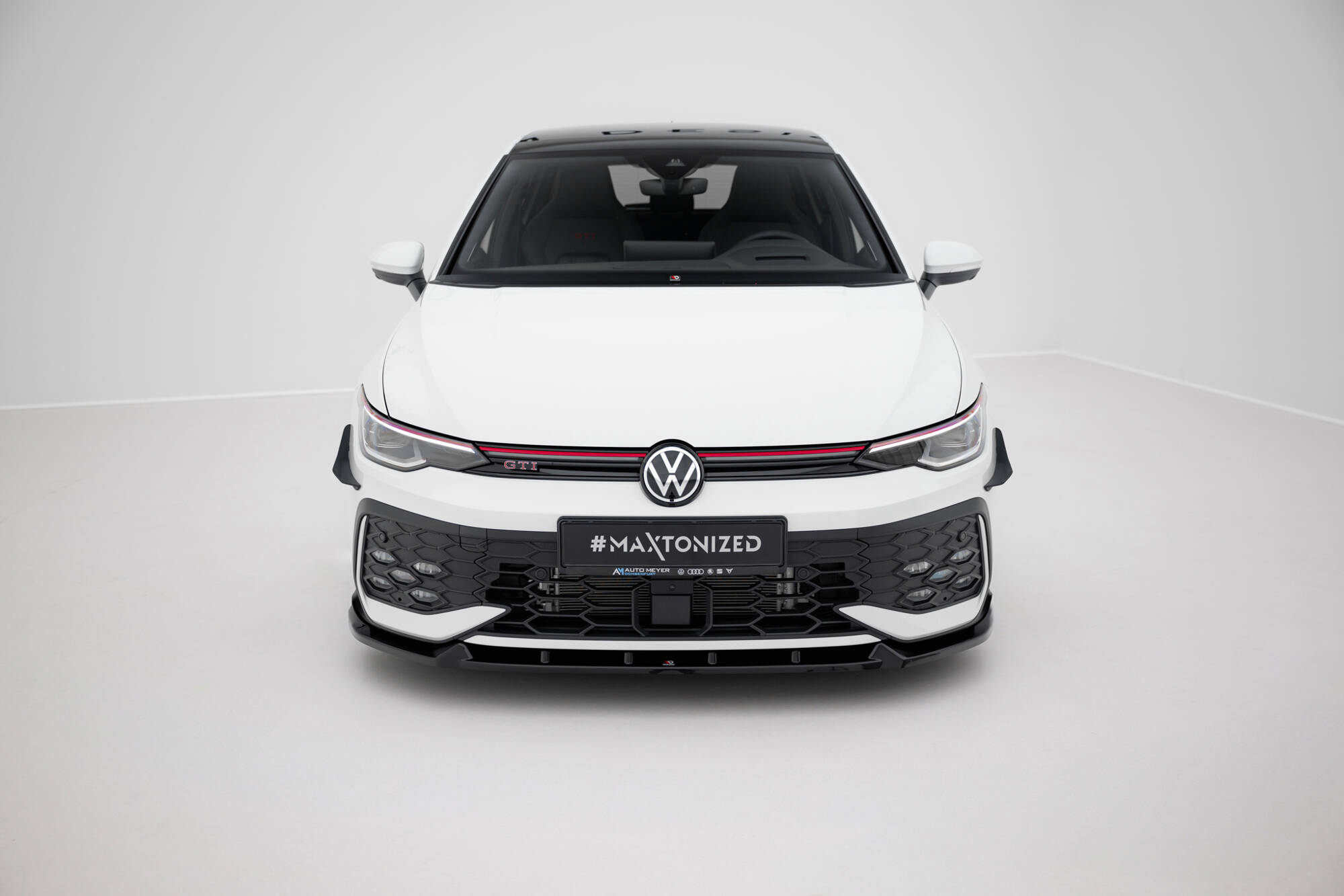 Voorspoiler V.2 Volkswagen Golf GTI / GTE / R-Line Mk8 Facelift Maxton Glanzend zwart