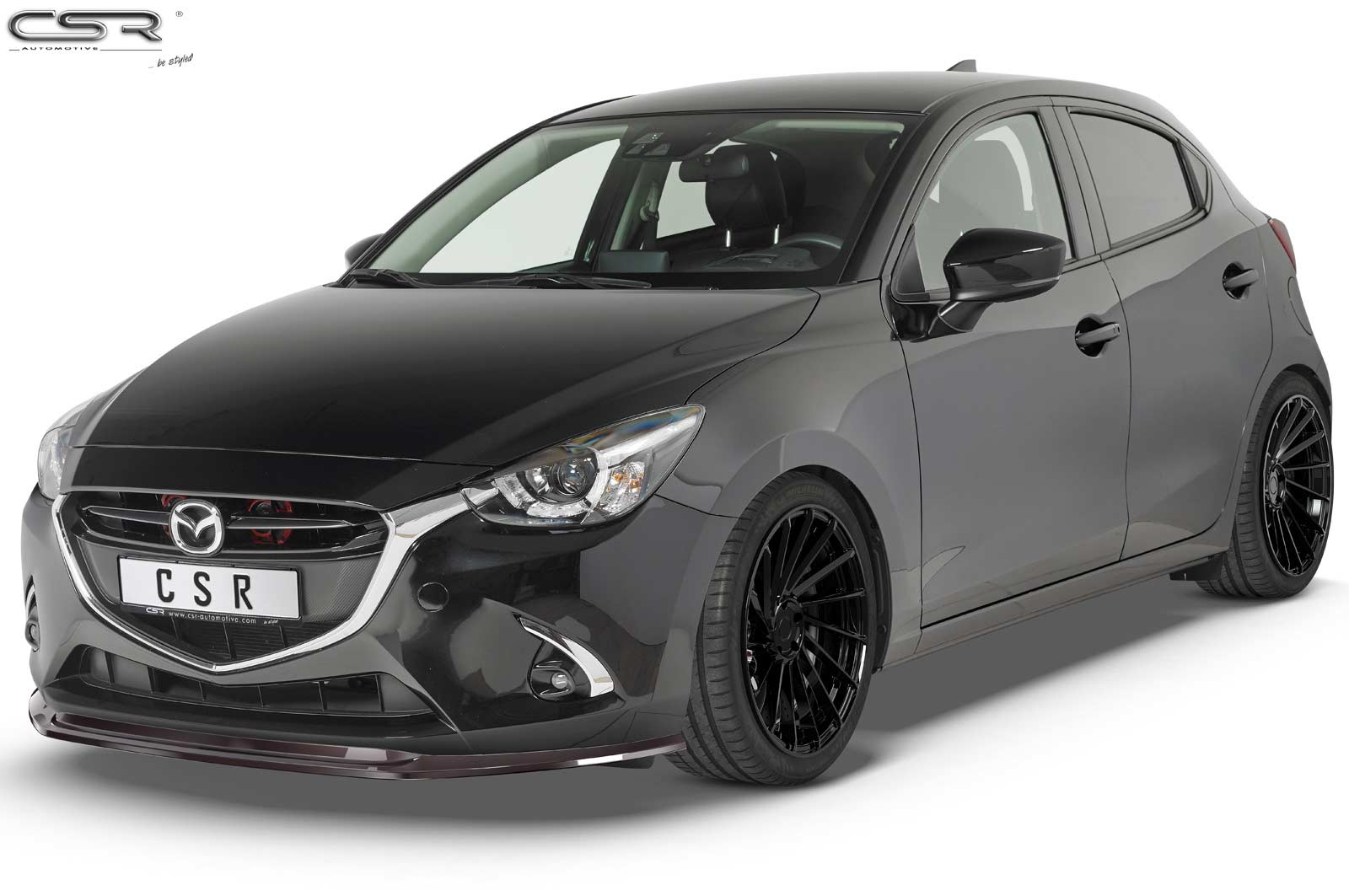 Voorspoiler Mazda 2 (Typ DJ) glans zwart 11/2014–12/2019