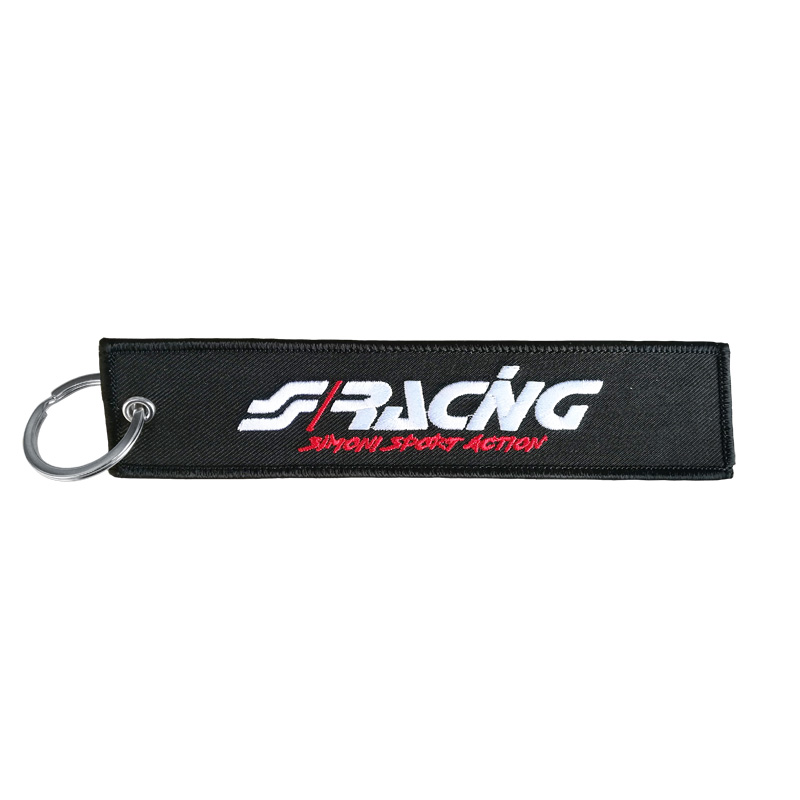 Simoni Racing Sleutelhanger Remove Before Drive - Zwart